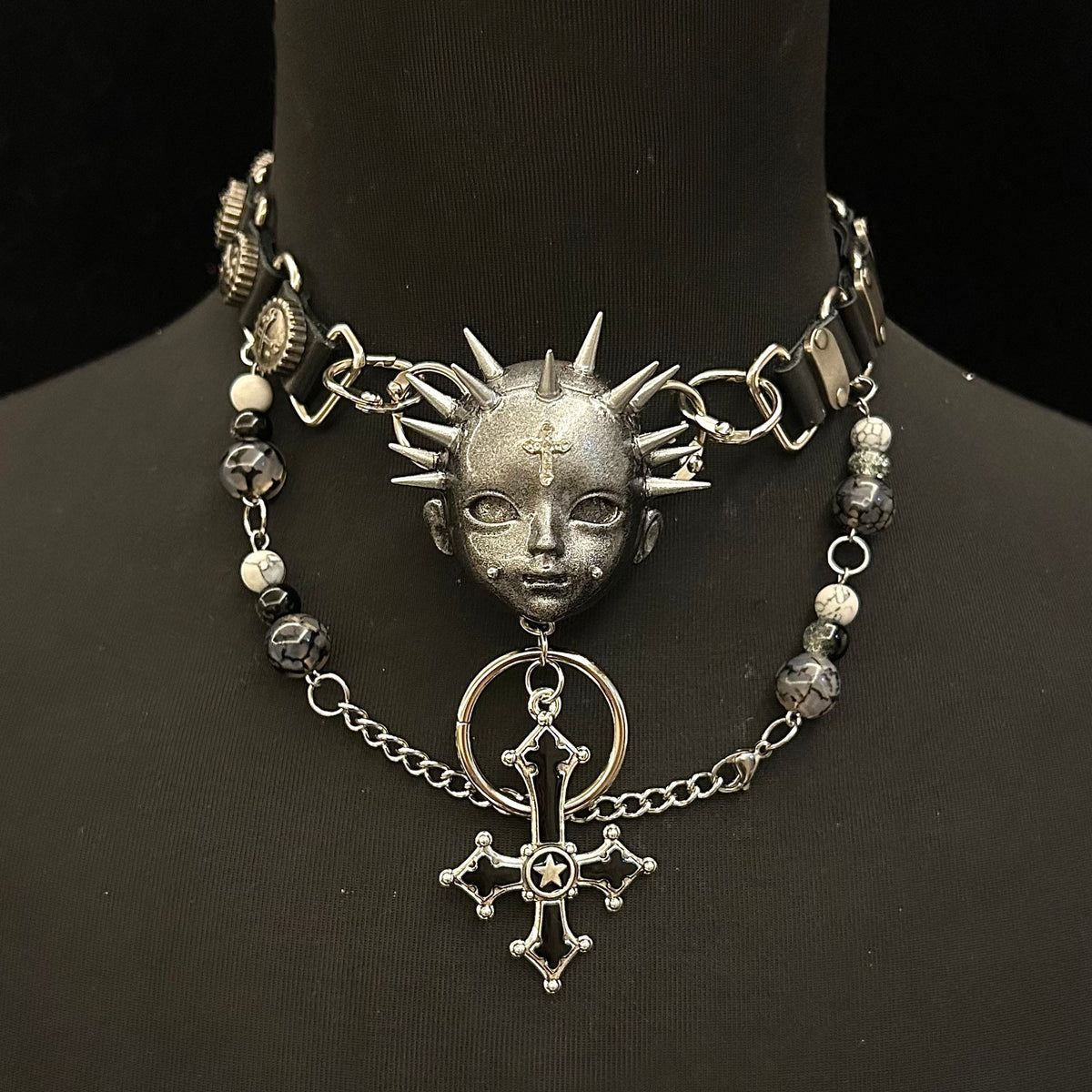 Silver Spiked Doll Face Necklace - Layered Beaded Chain & Inverted Cross Pendant - Crux Jewelry product image 1