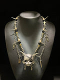 Silver Horned Stitched Doll Face Necklace with Cleaver, Knife & Coffin Charms - Crux Jewelry product image 1
