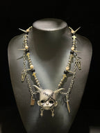 Silver Horned Stitched Doll Face Necklace with Cleaver, Knife & Coffin Charms - Crux Jewelry product image 1