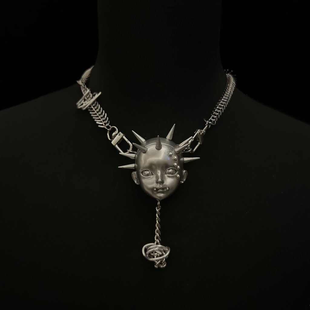 Silver Metallic Spiked Doll Face Necklace - Industrial Spine Chain & Abstract Knot Pendant - Crux Jewelry product image 1