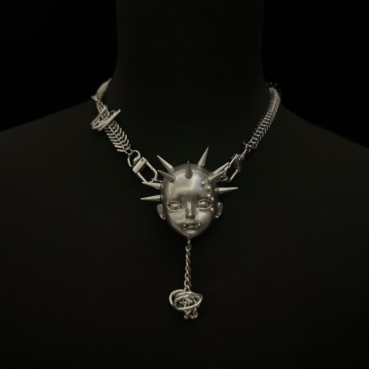 Silver Metallic Spiked Doll Face Necklace - Industrial Spine Chain & Abstract Knot Pendant - Crux Jewelry product image 1
