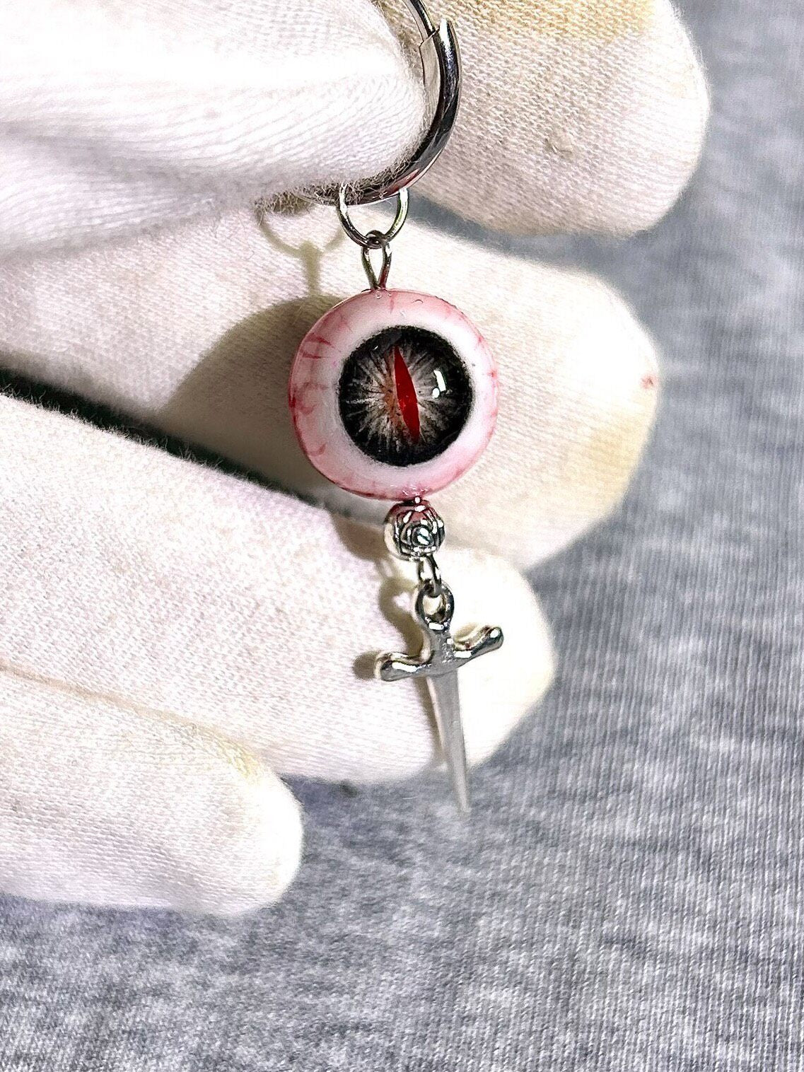 Vampire's Gaze | Gothic Bloodshot Slit Pupil Dagger Earrings - Crux Jewelry product image 1