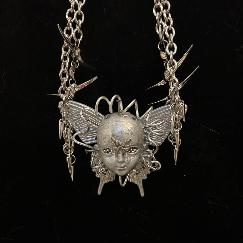 Cyberpunk Silver Metallic Butterfly Doll Face Necklace - Wire Wrapped & Spiked Chains - Crux Jewelry product image 1