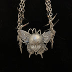 Cyberpunk Silver Metallic Butterfly Doll Face Necklace - Wire Wrapped & Spiked Chains - Crux Jewelry product image 1