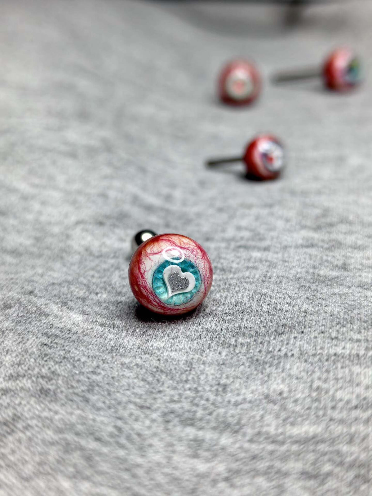 Artisan Heart-Pupil Bloodshot Eyeball | Titanium Eyeball Tongue/Ear/Lip Stud - Crux Jewelry product image 1