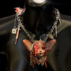 Menhera Bloody Injured Doll Face Necklace with Syringe & Revolver Charms - R - Crux Jewelry product photo