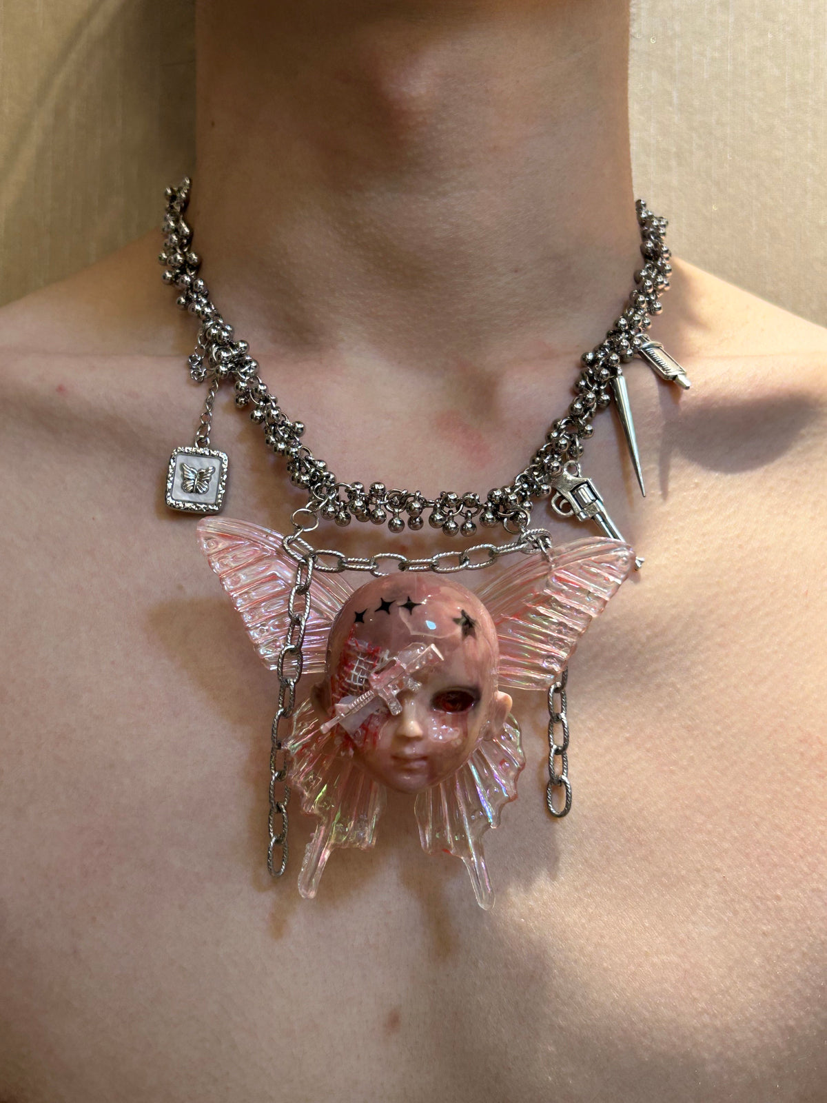 Holographic Pink Butterfly Injured Doll Necklace - Syringe & Revolver Charms - Crux Jewelry product image 2