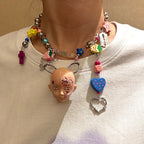 Y2K Decora Pink Doll Face Necklace with Smiley Star, Strawberry & Razor Blade Charms - Crux Jewelry product image 3