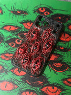 Uchiha Nightmare: Handmade Red Flesh Case with Multiple Sharingan Eyes (3D Texture) - Crux Jewelry product image 4
