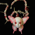 Yami Kawaii Pink Butterfly "Bleeding Eyes" Doll Face Necklace - Spikes & Blood... - Crux Jewelry product image 1