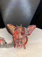 Menhera Bloody Injured Doll Face Necklace with Syringe & Revolver Charms - R - Crux Jewelry product photo