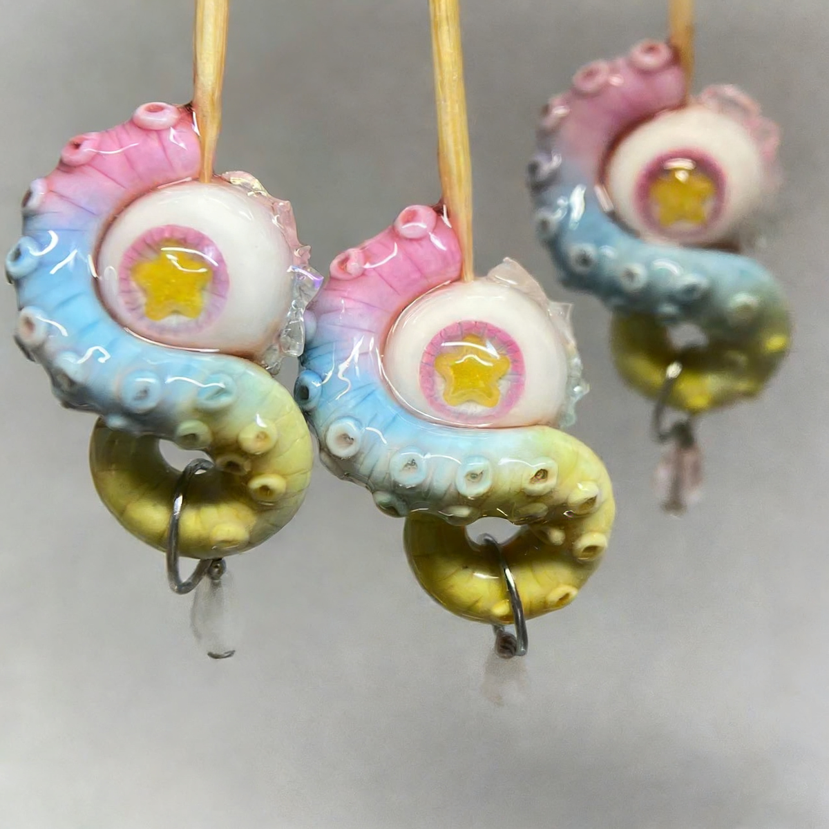 Mystic Star Cthulhu Eye – Purple Tentacle Earrings - Crux Jewelry product image 1