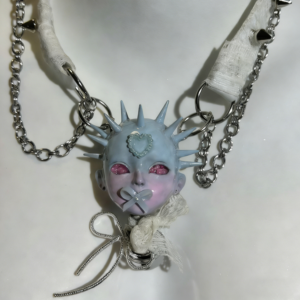 Pastel Goth Ice Blue Spiked Doll Face Choker with White Lace & Ribbon Pacifier - Crux Jewelry product photo