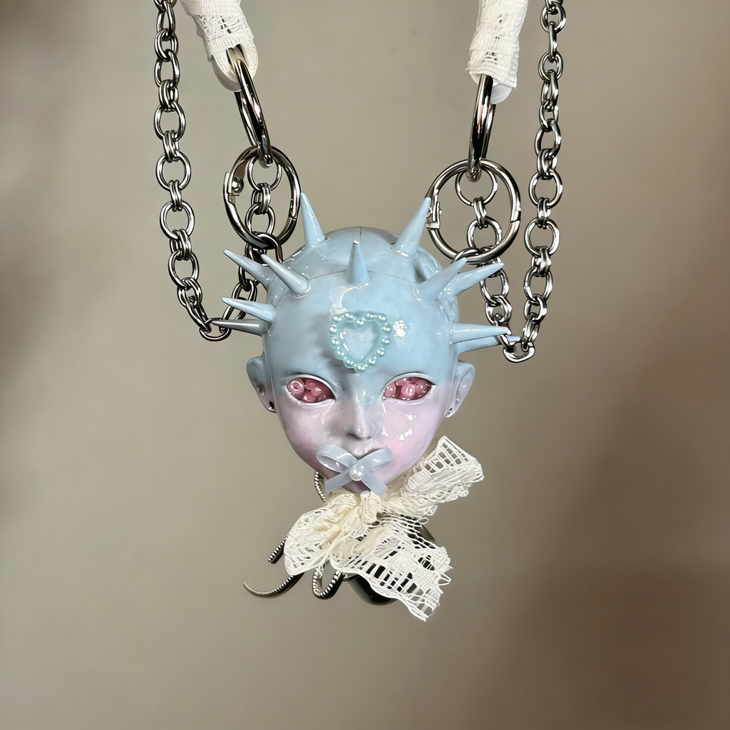 Pastel Goth Ice Blue Spiked Doll Face Choker with White Lace & Ribbon Pacifier - Crux Jewelry product photo