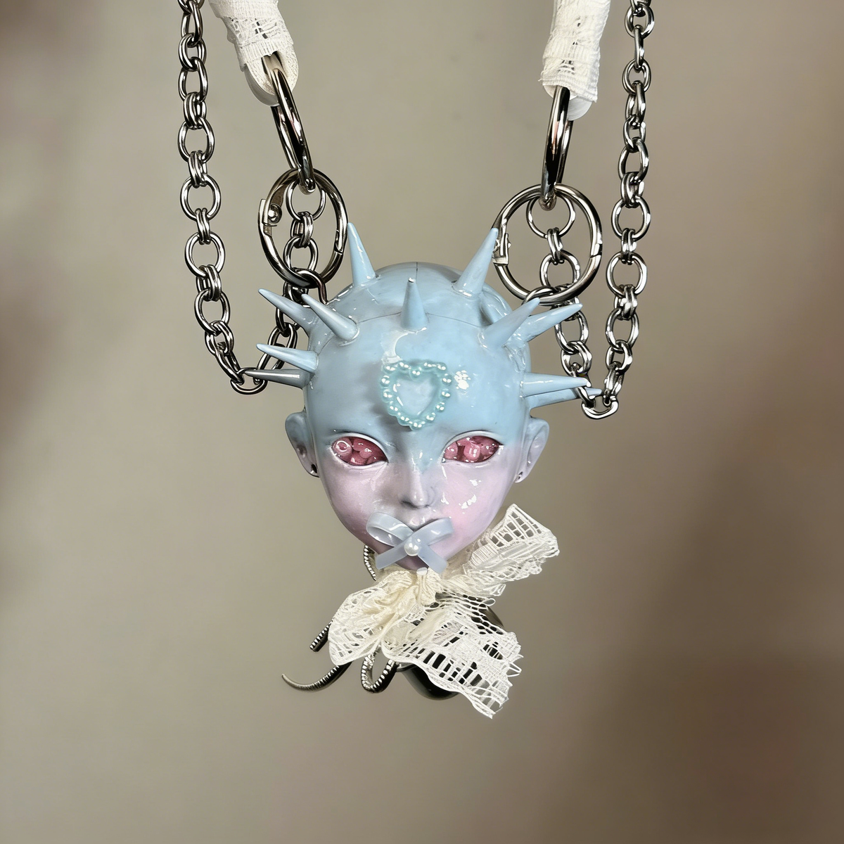Pastel Goth Ice Blue Spiked Doll Face Choker with White Lace & Ribbon Pacifier - Crux Jewelry product photo