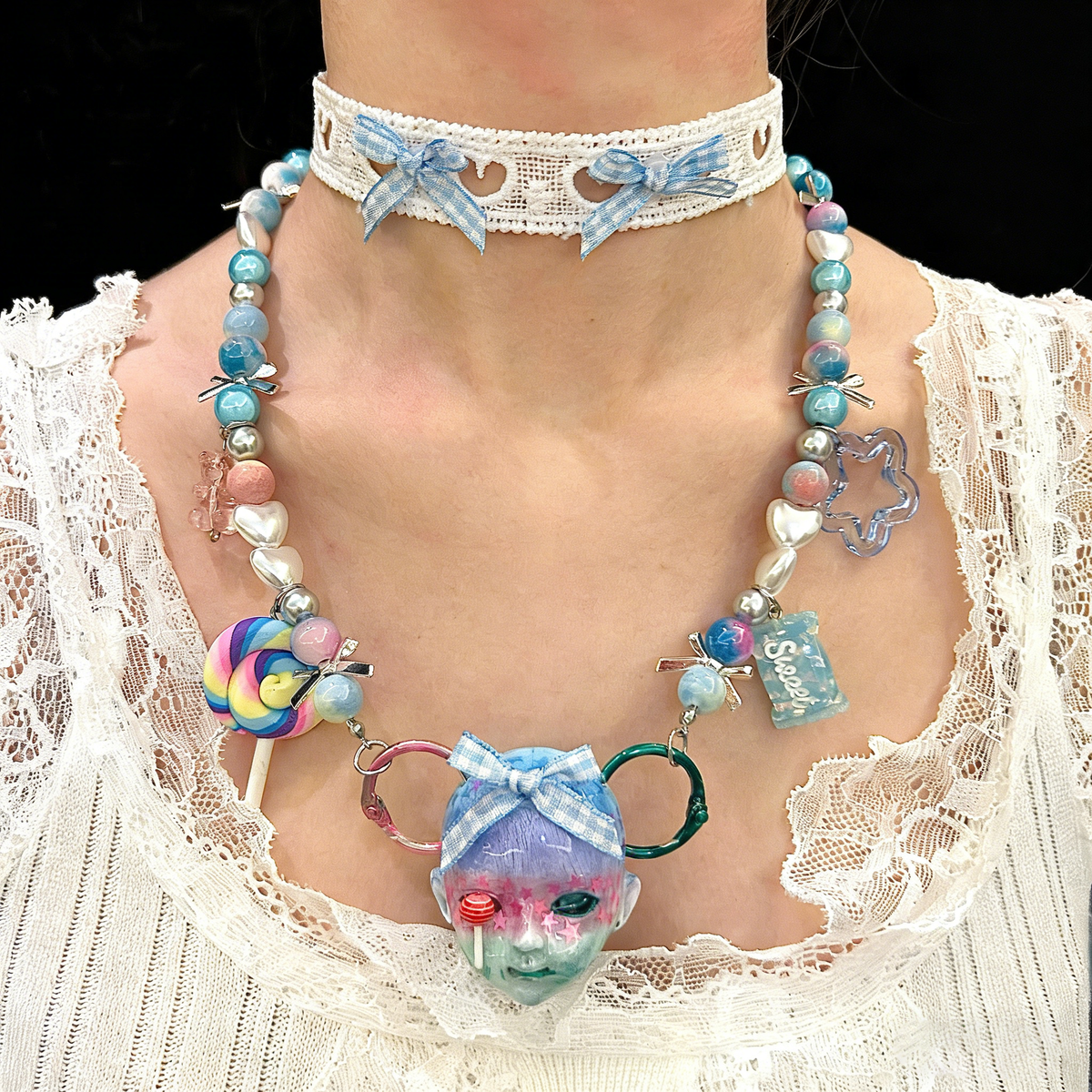 Sweet Lolita Pastel Doll Face Necklace with Rainbow & Blue Gingham Bows - Crux Jewelry product image 1