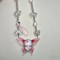 Coquette Pink Butterfly Doll Face Pearl Necklace with Silver Bows & Ribbons - Crux Jewelry product photo