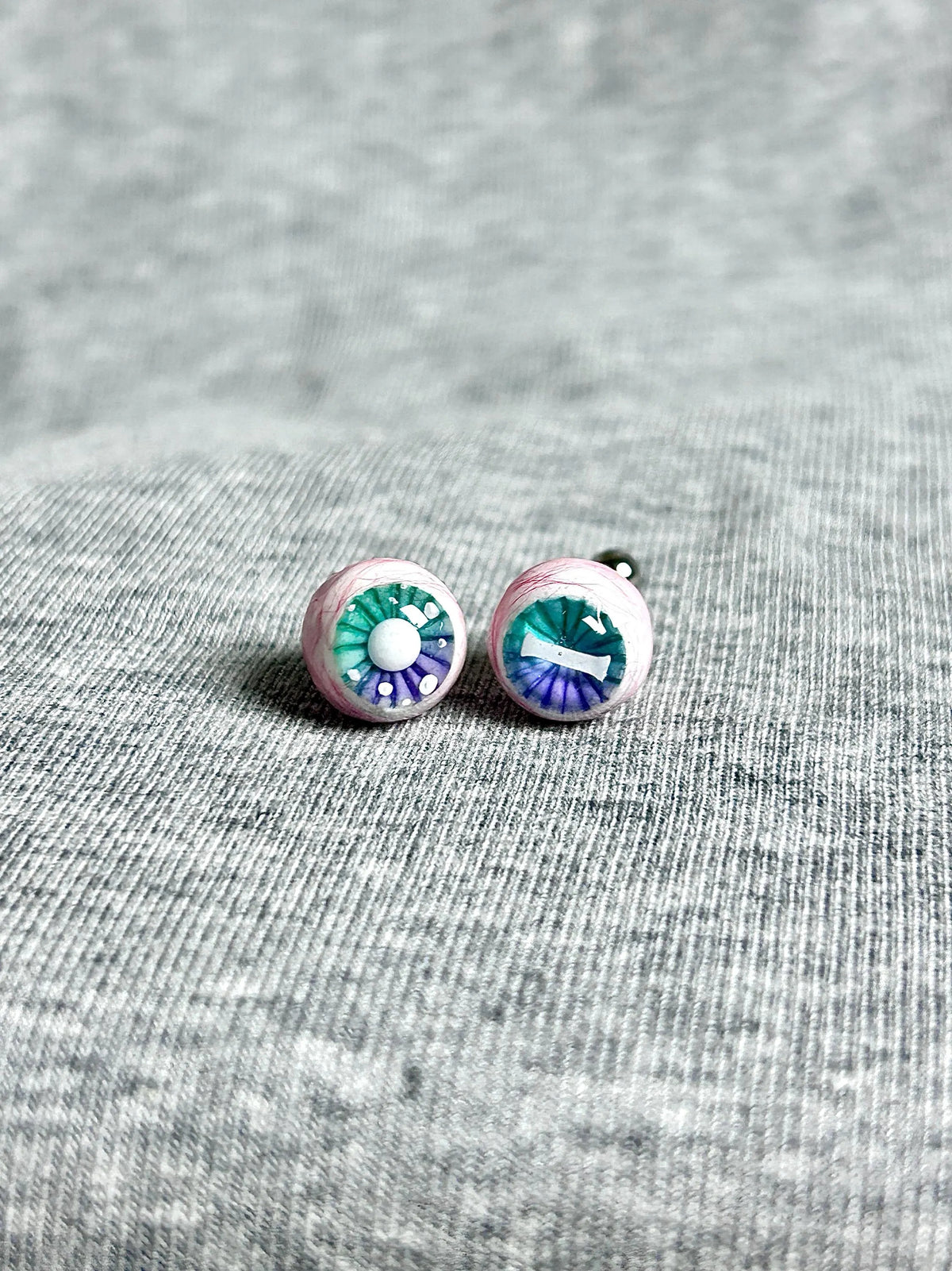 "Ghostly Pet" Mismatched Eyeball Studs - Aurora Iris (Bone & Moon) - Crux Jewelry product image 1