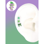 Spike green criss-cross and ribbon bow ear studs