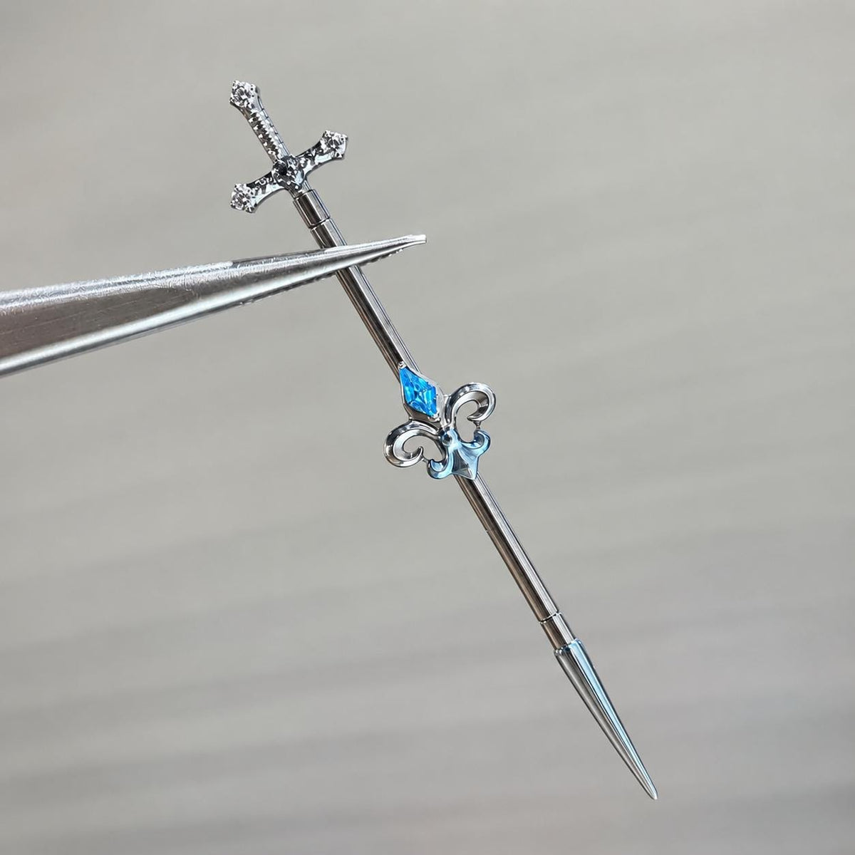 Fleur-de-Lis Sword industrial barbell detail 6
