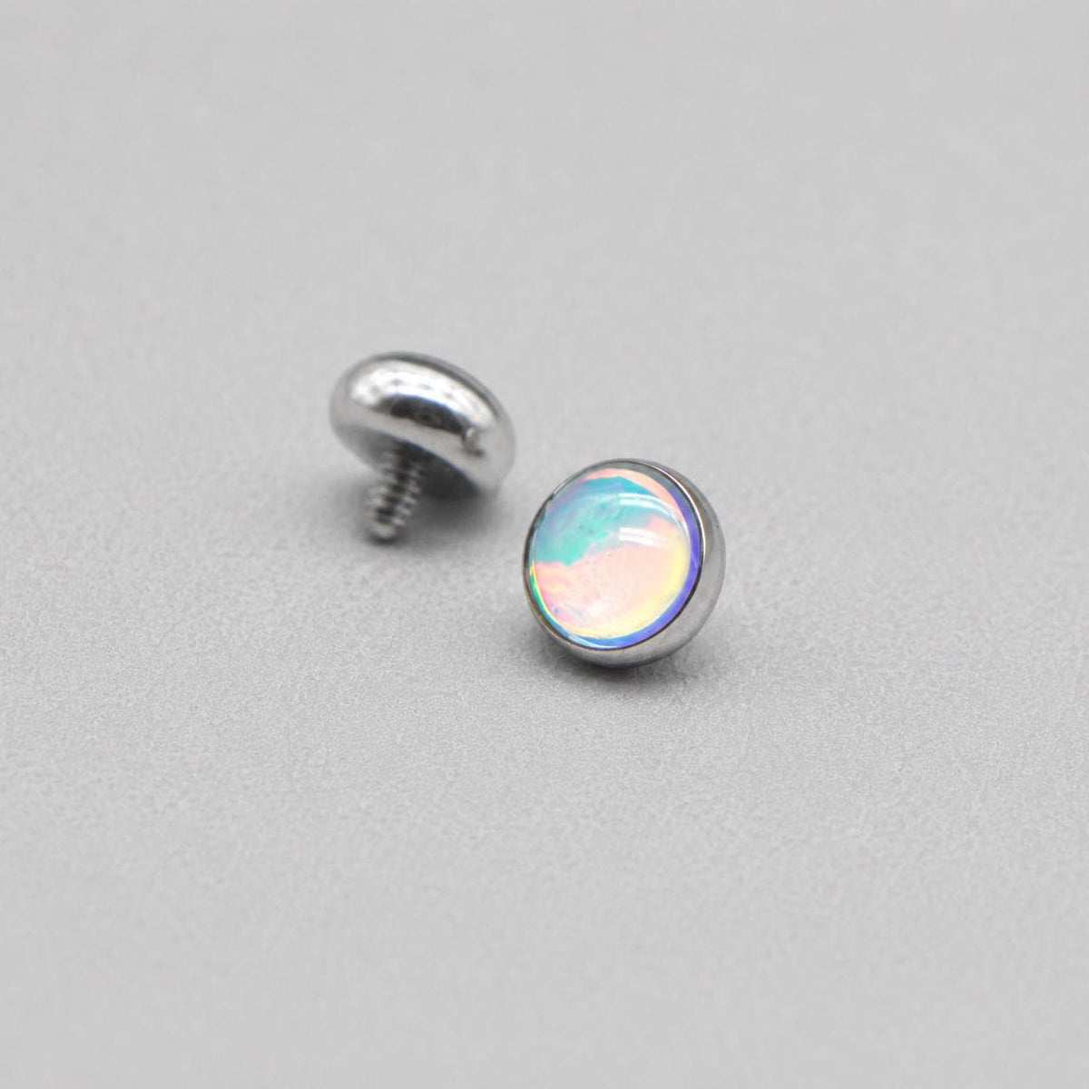 Liquid Aura Cabochon Light Blue F136 Titanium piercing top